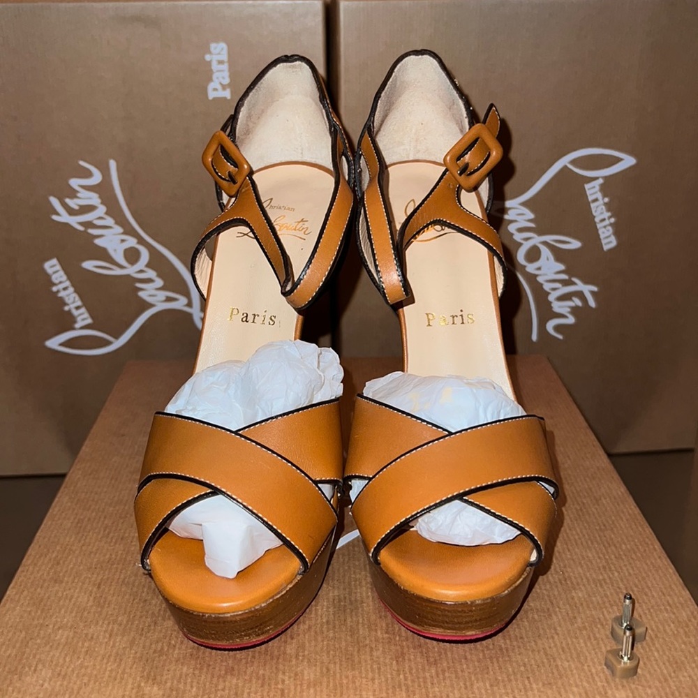 Worn a few times.  Red Rubber sole from Shoe Spa NYC, 5 1/2 inch heels.